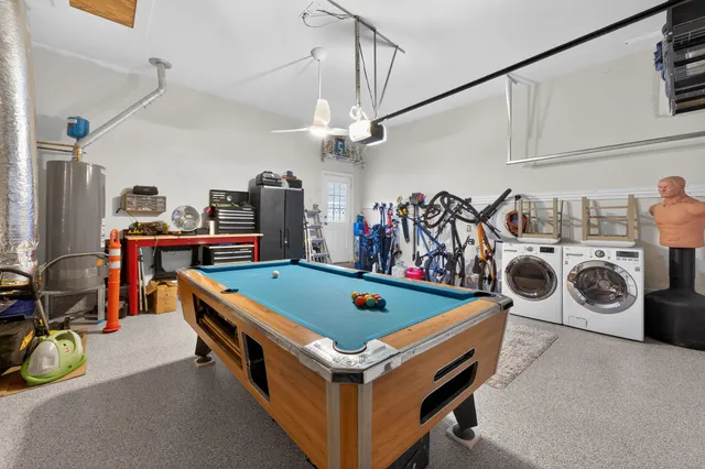 a living room with furniture gym equipment and a flat screen tv