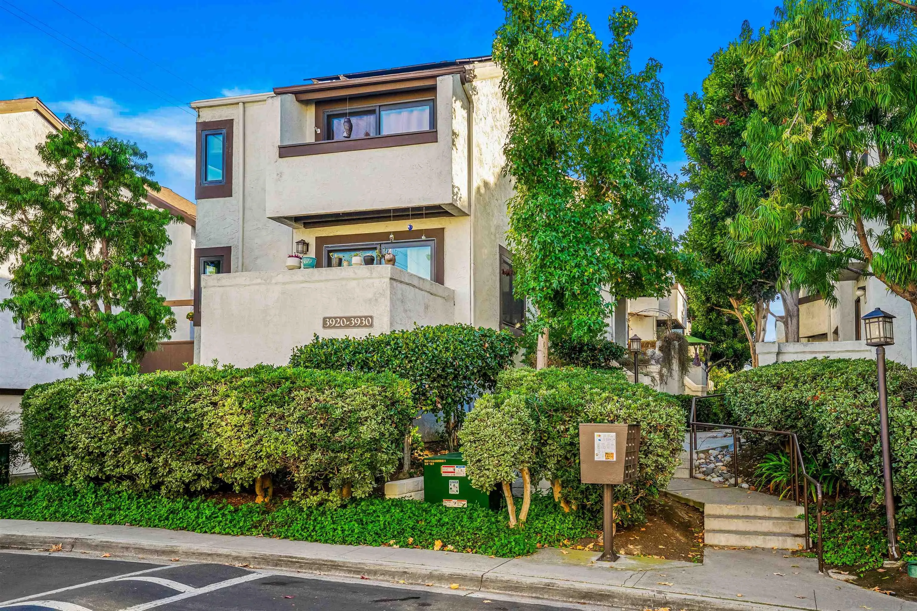 3926 Voltaire Street San Diego, CA 92107 - Photo 1 of 30 a front view of a house with a yard