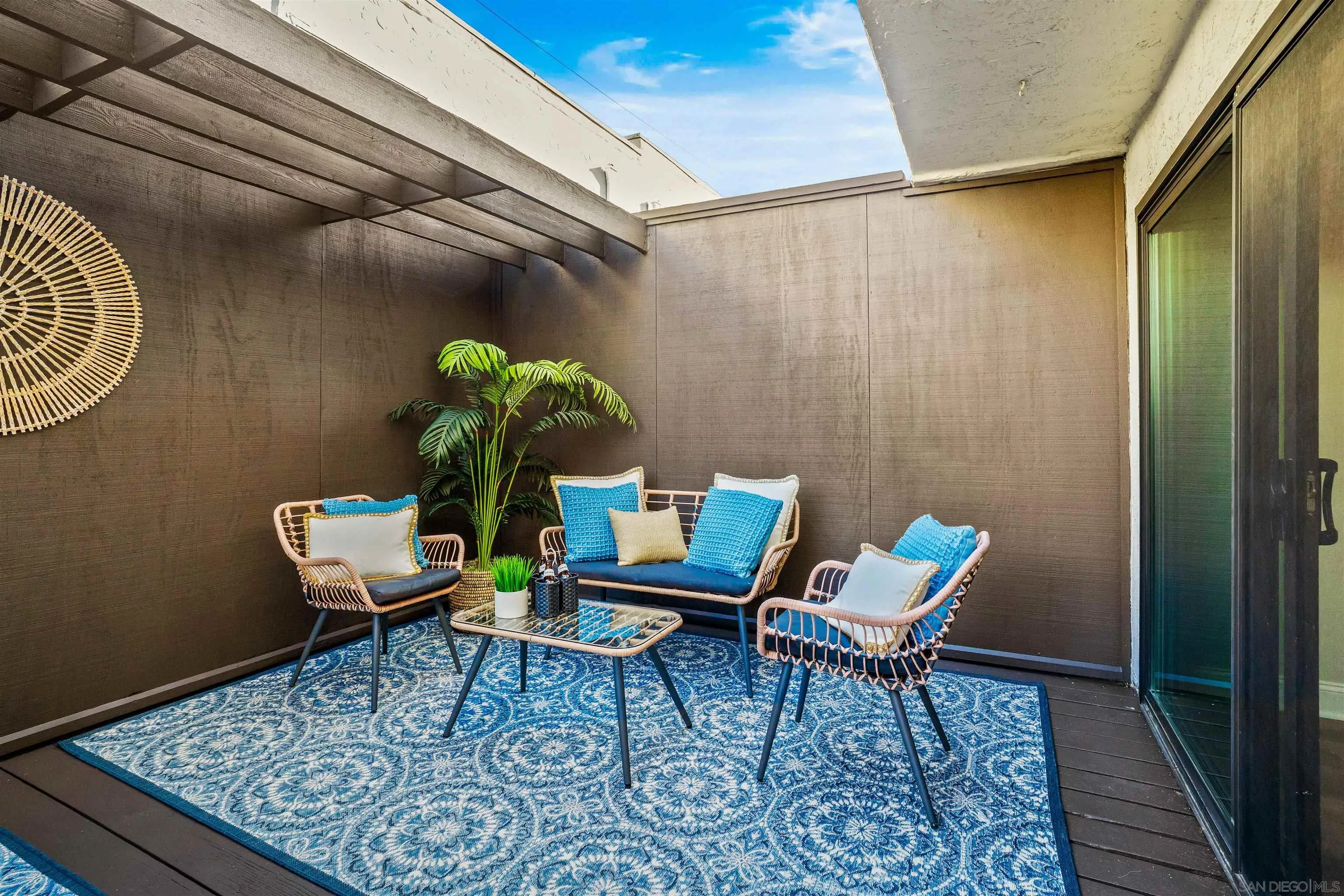 3926 Voltaire Street San Diego, CA 92107 - Photo 17 of 30 a reading room with furniture and a wooden floor