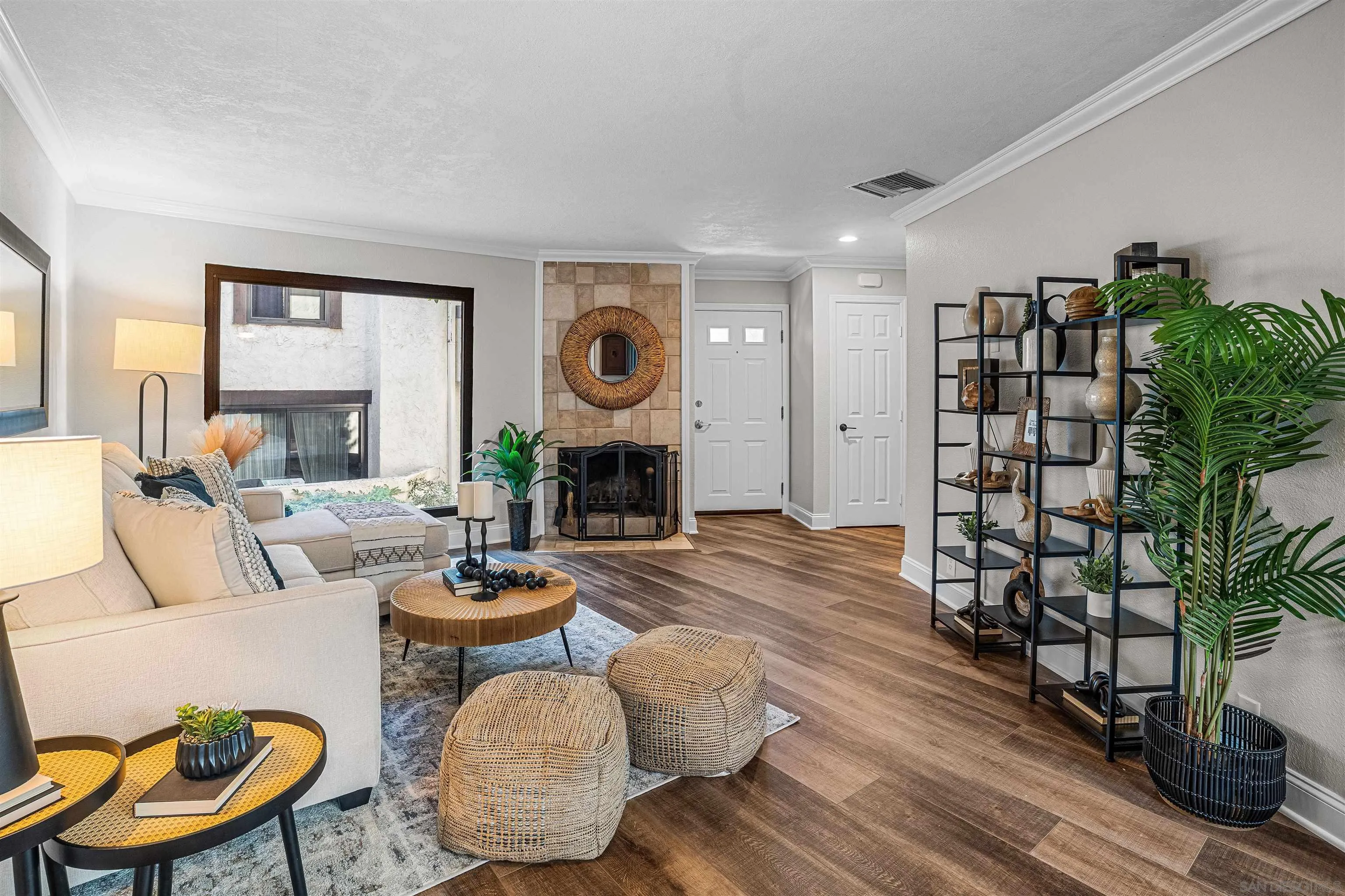 3926 Voltaire Street San Diego, CA 92107 - Photo 3 of 30 a living room with fireplace furniture and a large window