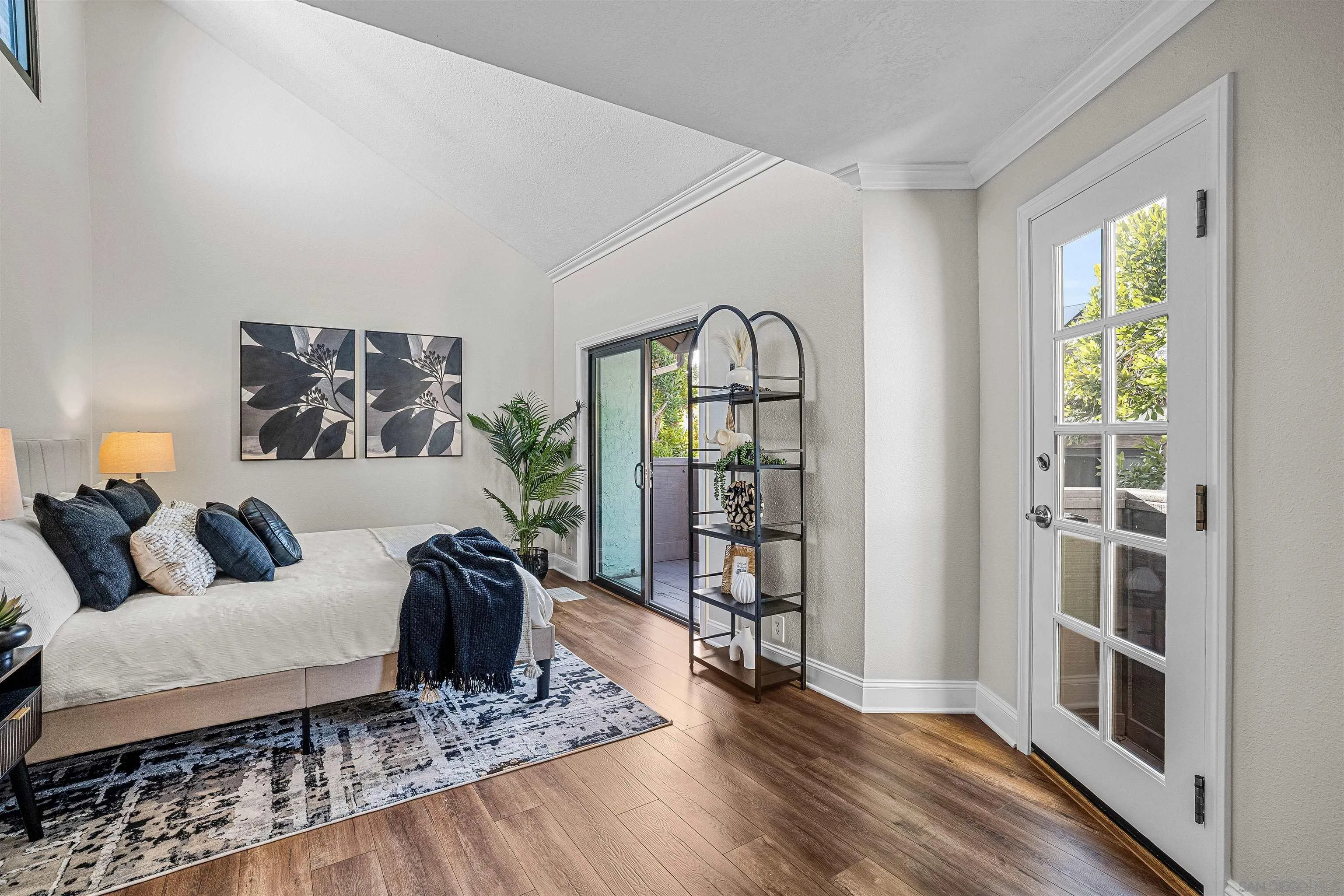 3926 Voltaire Street San Diego, CA 92107 - Photo 10 of 30 a living room with furniture and a wooden floor