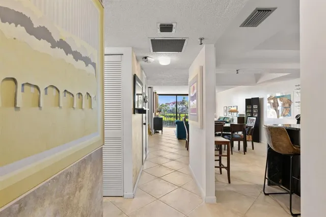 a view of a living room and dining room
