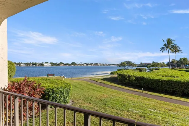 a view of a balcony with lake view