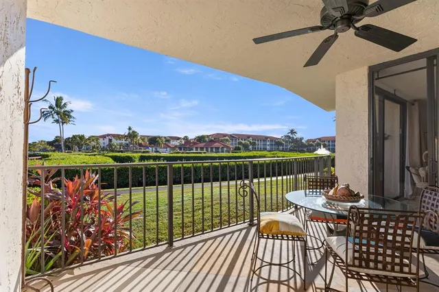 a view of balcony with furniture