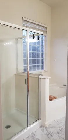 a bathroom with a sink and mirror