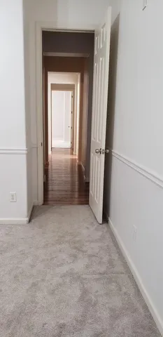 a bathroom with a toilet and shower