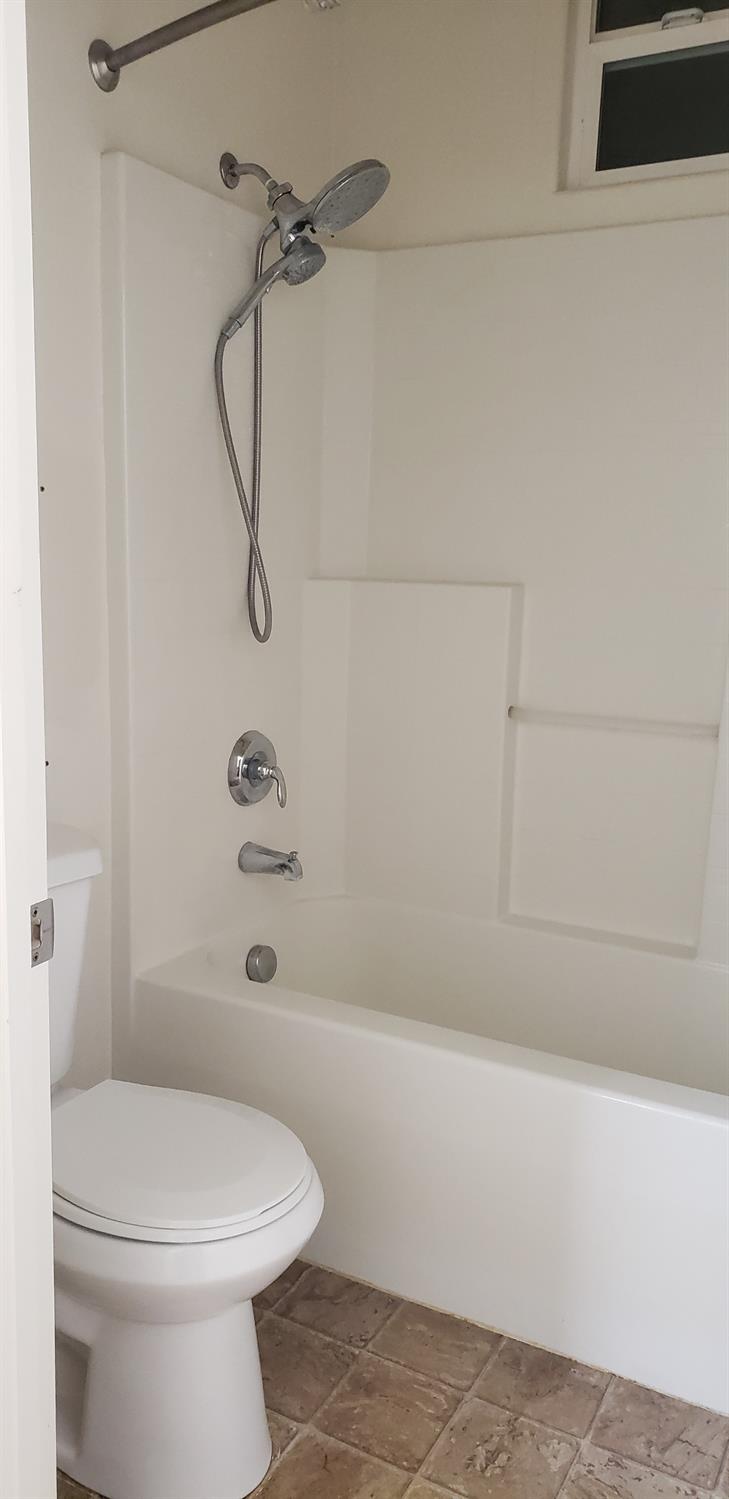 10726 Irene Way Live Oak, CA 95953 - Photo 24 of 50 a bathroom with a toilet and shower