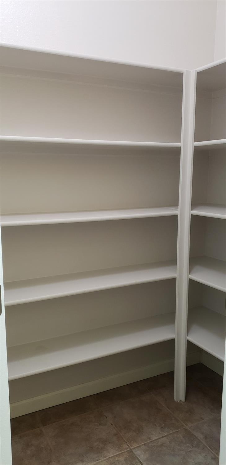 10726 Irene Way Live Oak, CA 95953 - Photo 37 of 50 a view of a closet with wooden floor