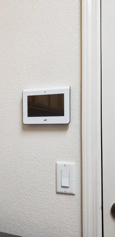 a view of hallway with wooden floor