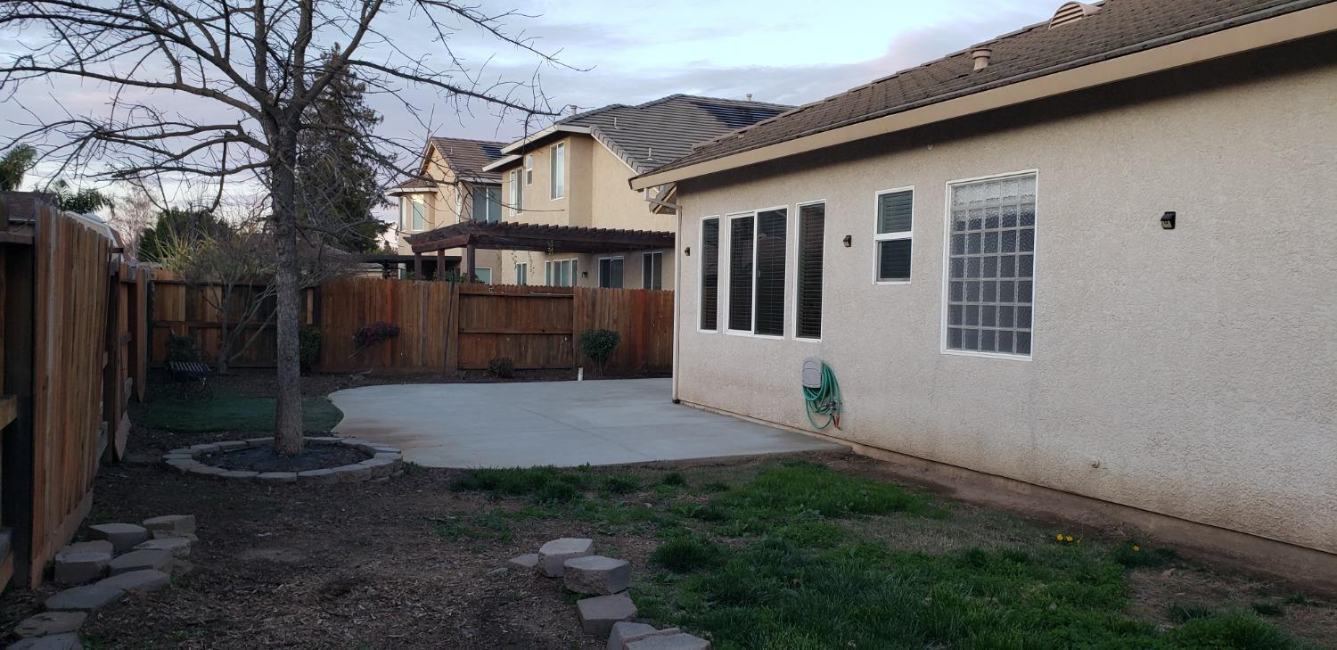 10726 Irene Way Live Oak, CA 95953 - Photo 5 of 50 a front view of a house with garden