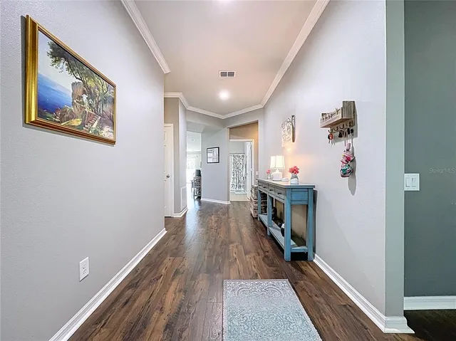 a very nice looking room with wooden floor