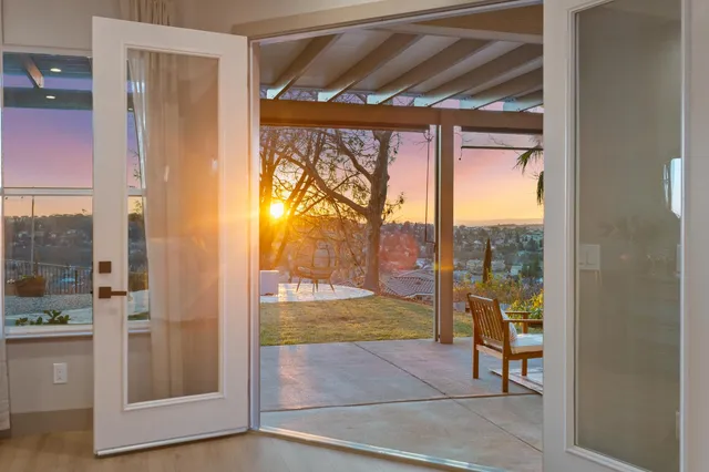 a view of a swimming pool with a patio