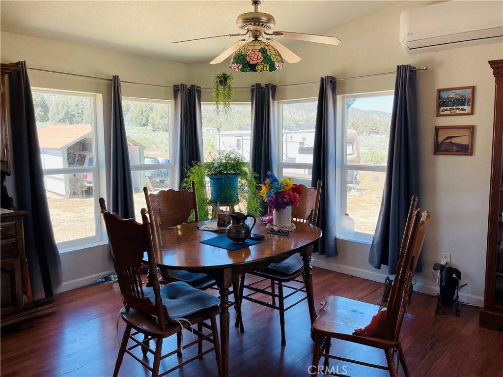 12955 Boy Scout Camp Road Frazier Park, CA 93225 - Photo 3 of 14 a view of a dining room with furniture window and wooden floor