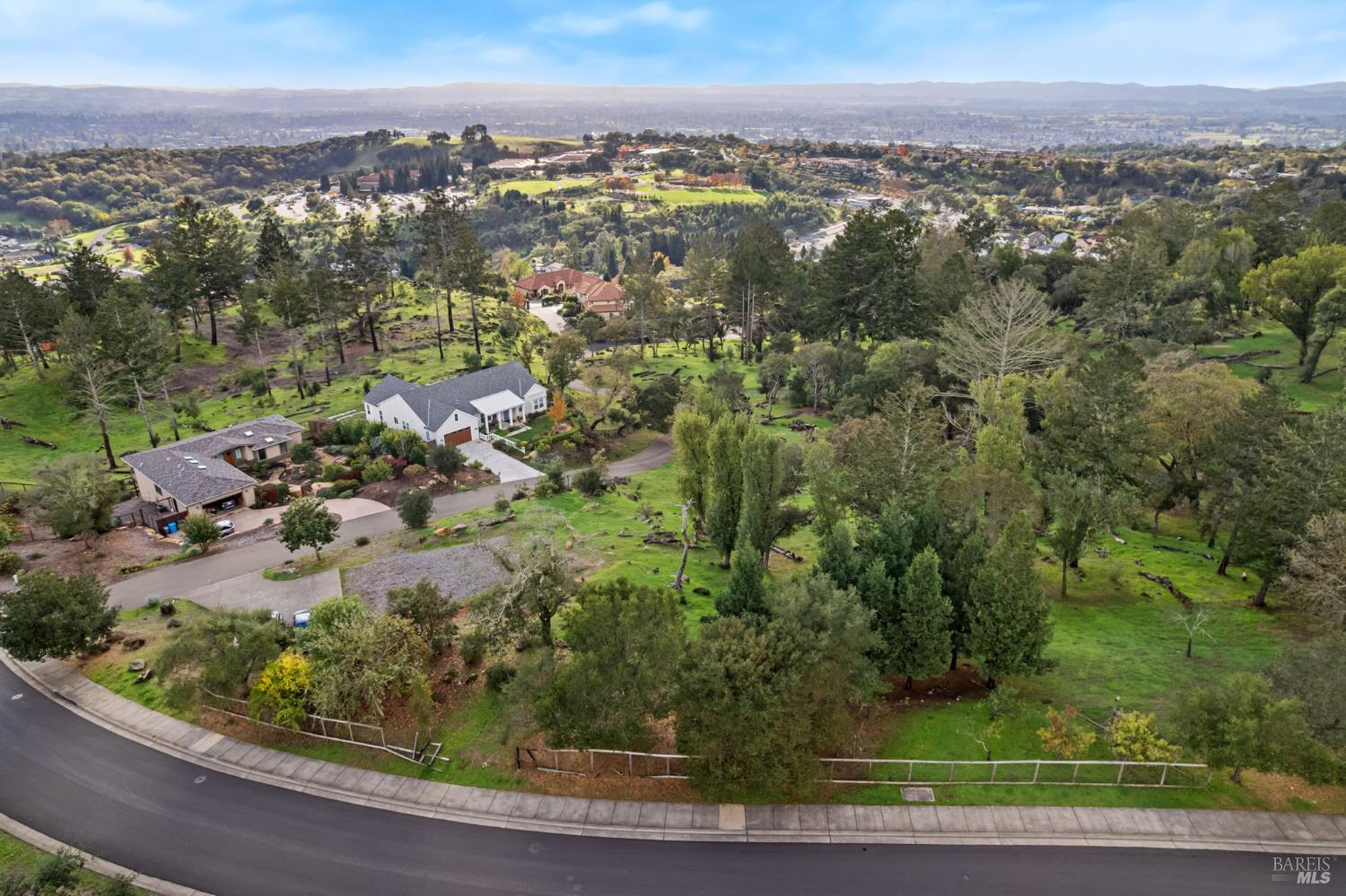 3903 Parker Hill Road Santa Rosa, CA 95404 - Photo 31 of 36 an aerial view of residential houses with outdoor space and trees