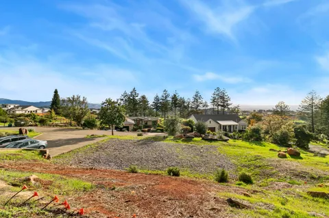 a view of a yard with an outdoor space
