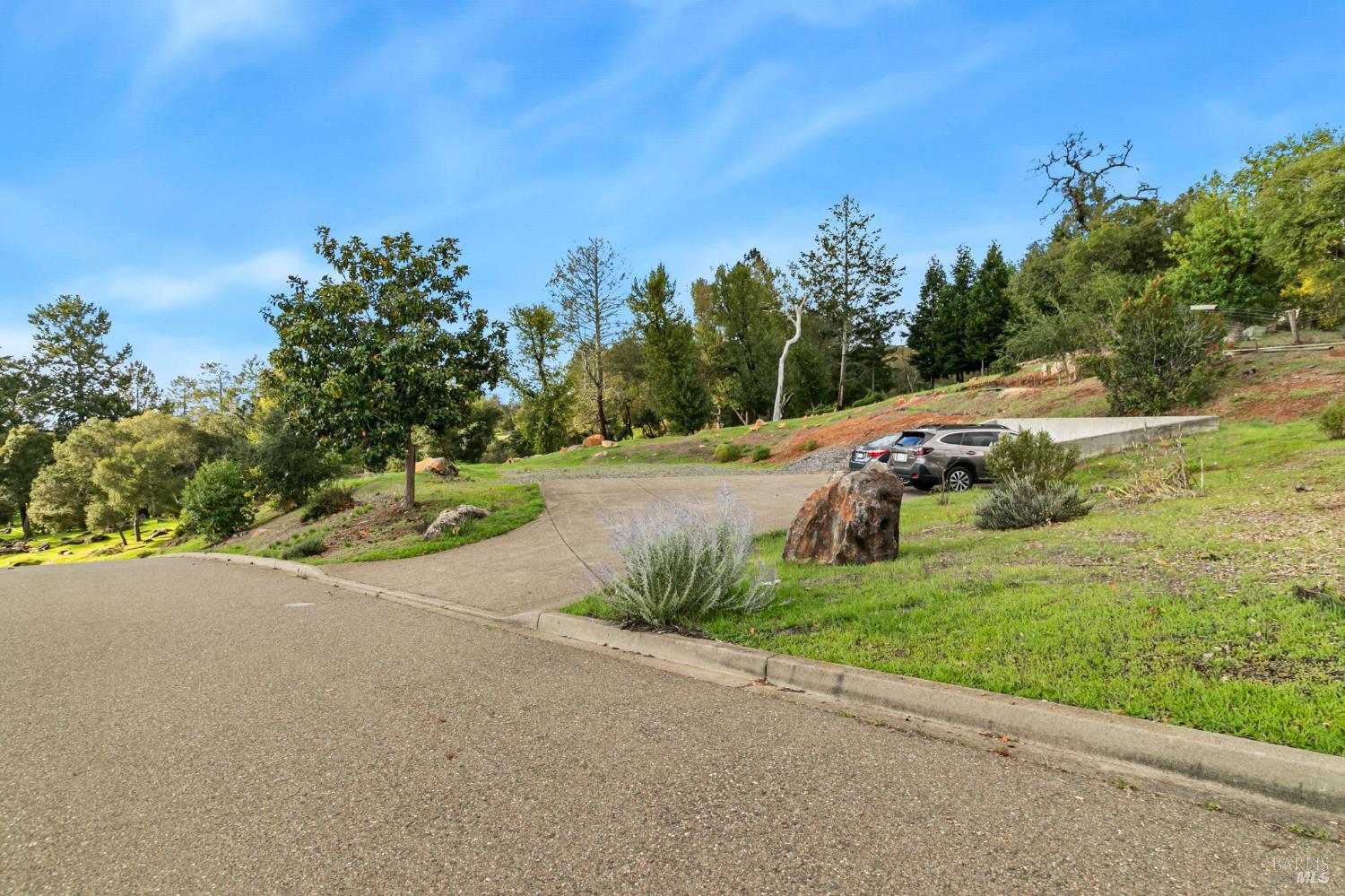 3903 Parker Hill Road Santa Rosa, CA 95404 - Photo 9 of 36 a view of a street with a yard