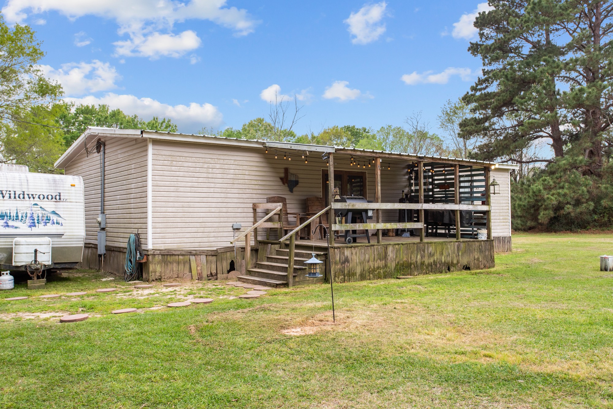 991 Herman Nerren Road Huntington, TX 75949 - Photo 21 of 23 a view of a house with a backyard