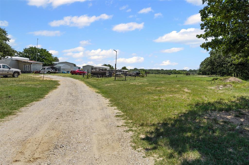 3100 Sarra Lane Springtown, TX 76082 - Photo 11 of 40 a view of a lake with a big yard