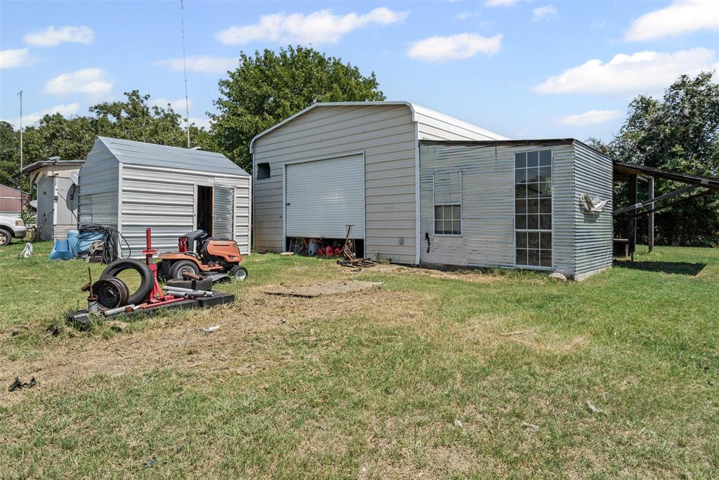 3100 Sarra Lane Springtown, TX 76082 - Photo 16 of 40 a view of a backyard of the house