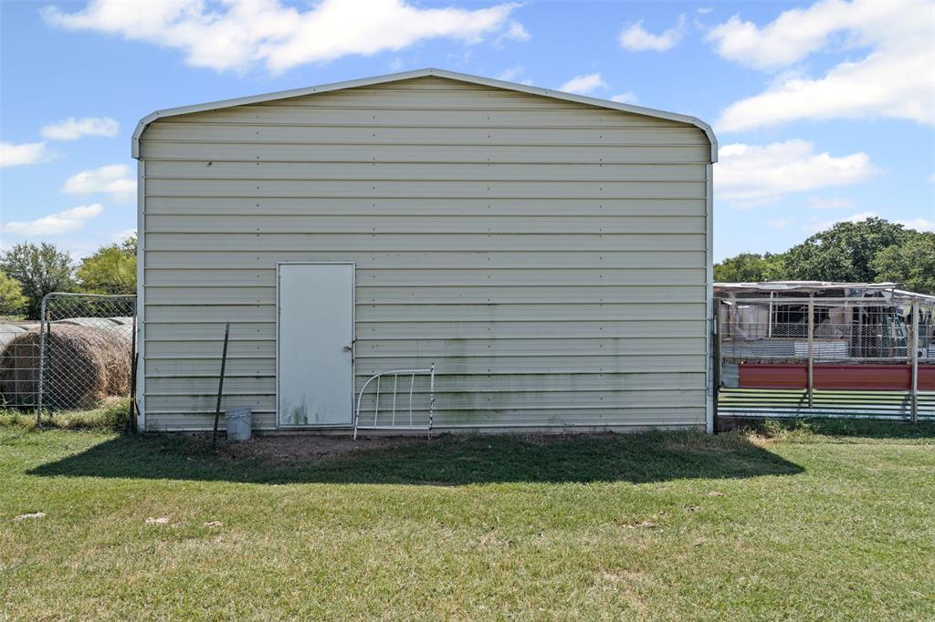 3100 Sarra Lane Springtown, TX 76082 - Photo 17 of 40 a front view of a house with a yard