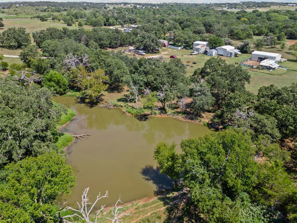 3100 Sarra Lane Springtown, TX 76082 - Photo 31 of 40 an aerial view of city and lake with trees