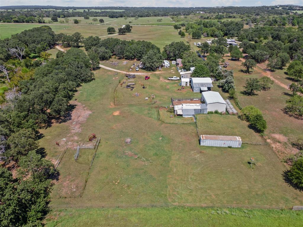 3100 Sarra Lane Springtown, TX 76082 - Photo 33 of 40 an aerial view of a house with a lake view