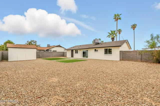 a house view with a garden space