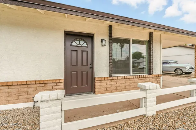 a view of a entryway door front of house