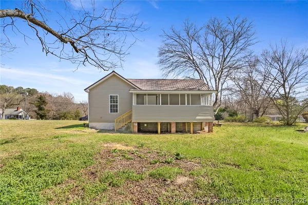 a house view with a garden space