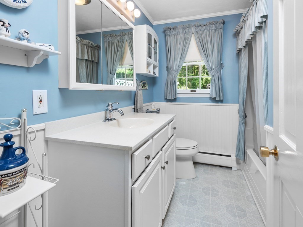 39 Fitzgerald Road Charlton, MA 01507 - Photo 24 of 37 a bathroom with a sink a toilet and a window
