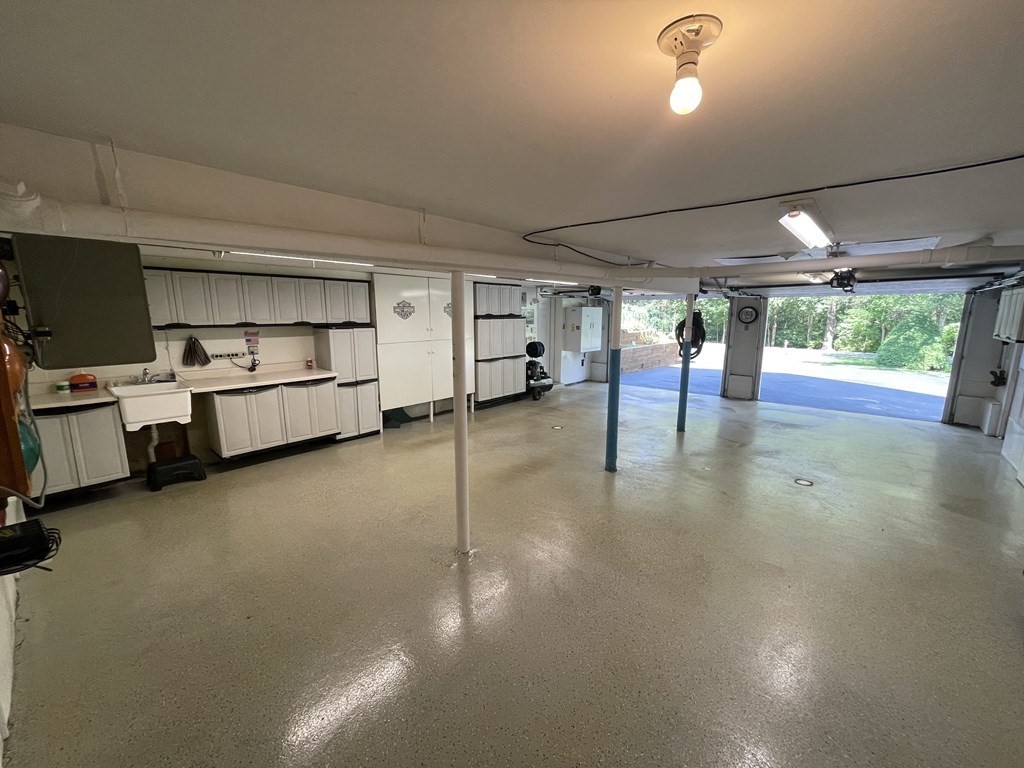 39 Fitzgerald Road Charlton, MA 01507 - Photo 36 of 37 a view of a room with gym equipment and a large window