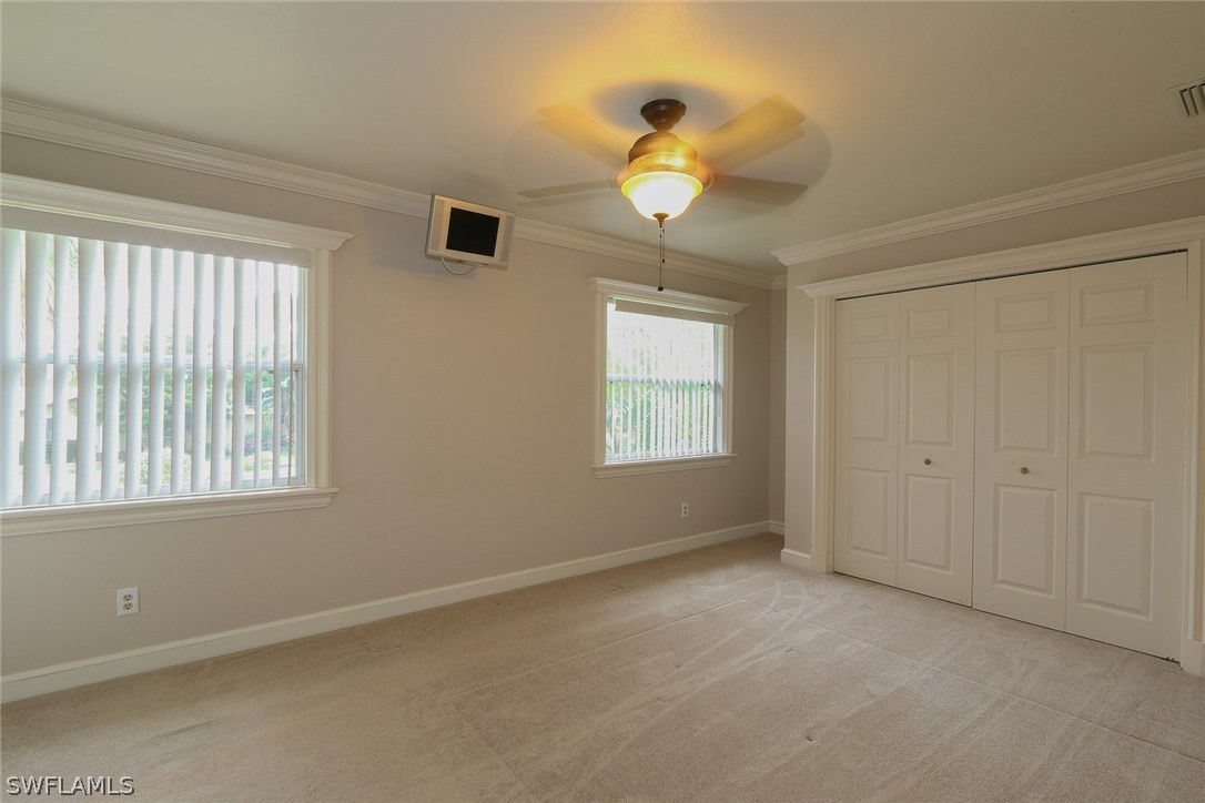 8430 Cardinal Road Fort Myers, FL 33967 - Photo 12 of 19 a view of an empty room with a window