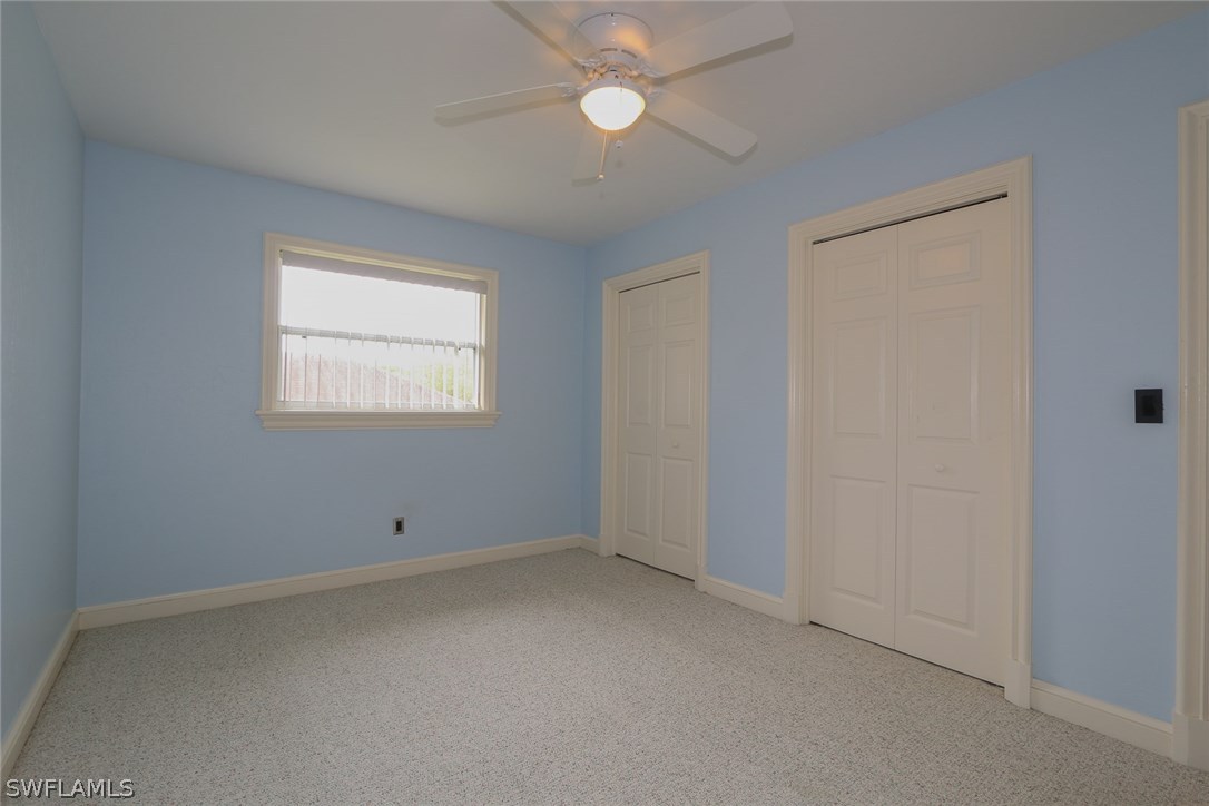 8430 Cardinal Road Fort Myers, FL 33967 - Photo 14 of 19 an empty room with a fan & a window