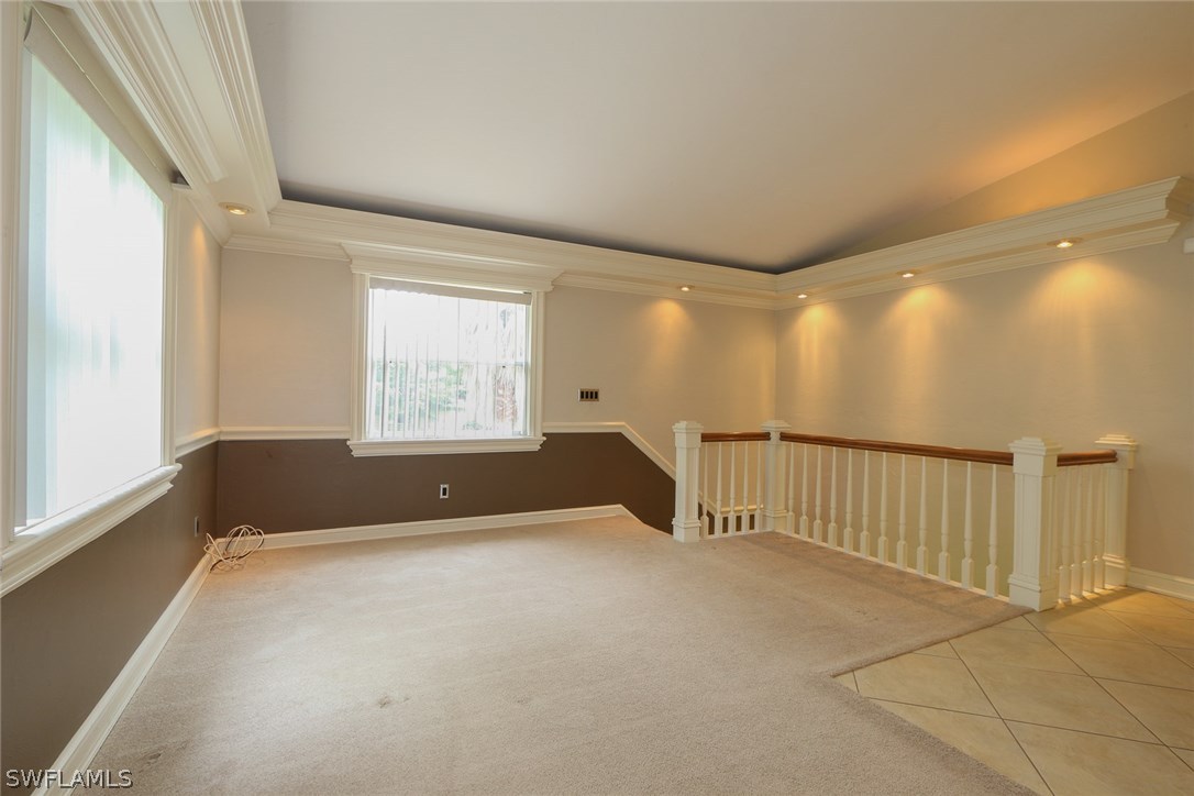 8430 Cardinal Road Fort Myers, FL 33967 - Photo 4 of 19 a view of an empty room with a window