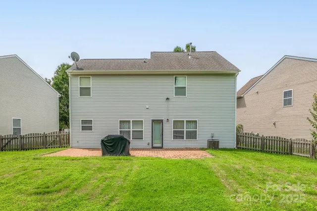a house view with a garden space