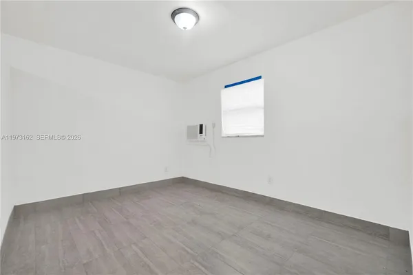 an empty room with a window