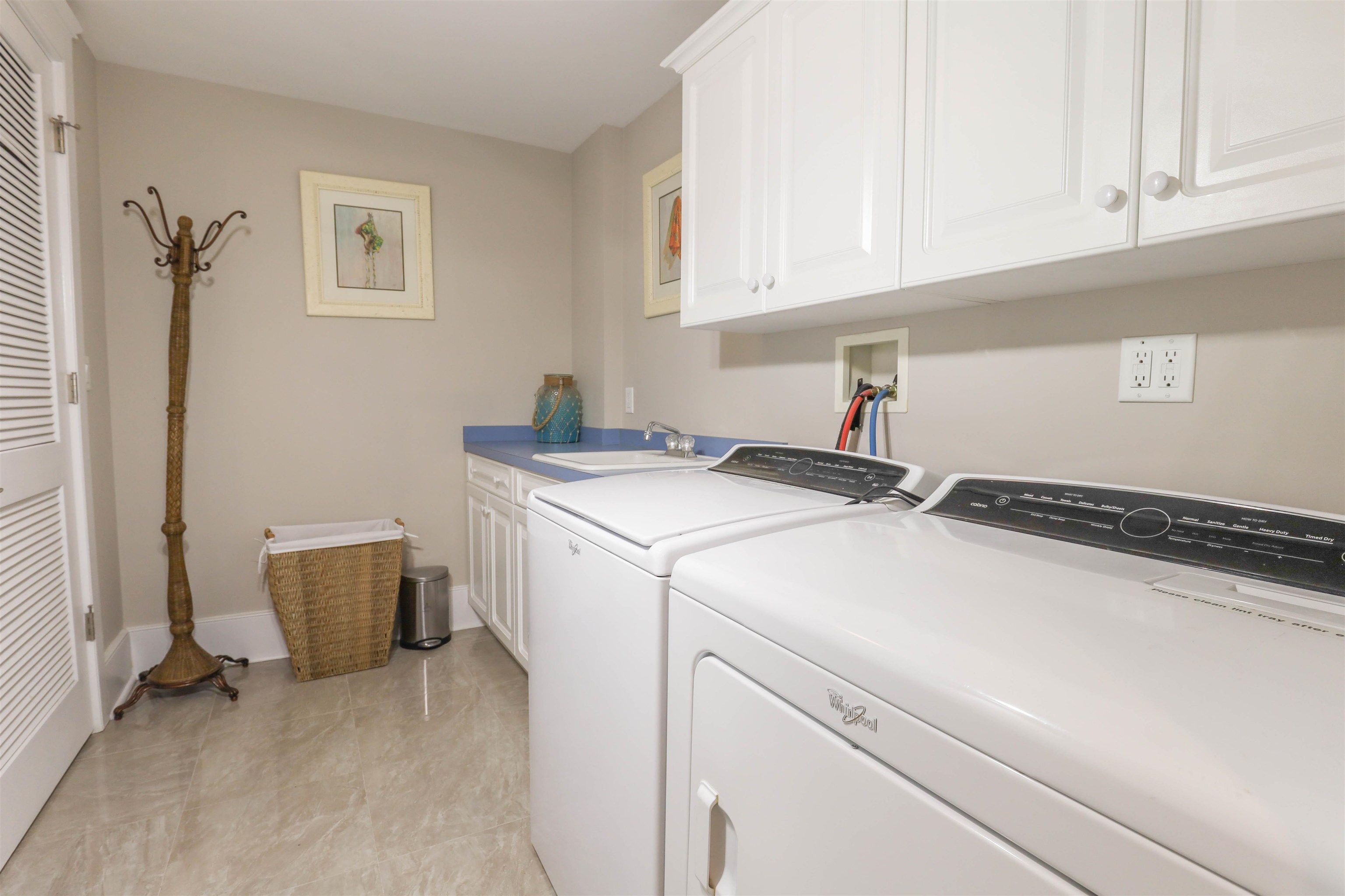 7701 Atlantic Avenue, Unit 102 Wildwood Crest, NJ 08260 - Photo 15 of 25 a room with storage and utility