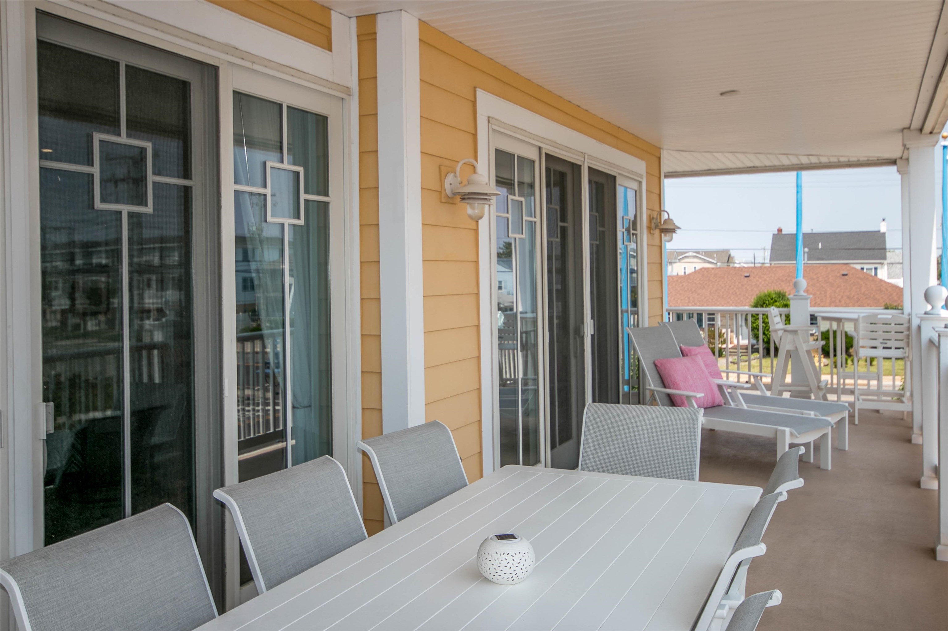7701 Atlantic Avenue, Unit 102 Wildwood Crest, NJ 08260 - Photo 9 of 25 a view of a living room and a balcony