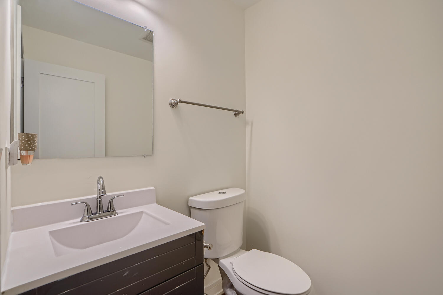2603 Chelsey Street Buffalo Grove, IL 60089 - Photo 12 of 28 a white toilet sitting next to a bathroom sink