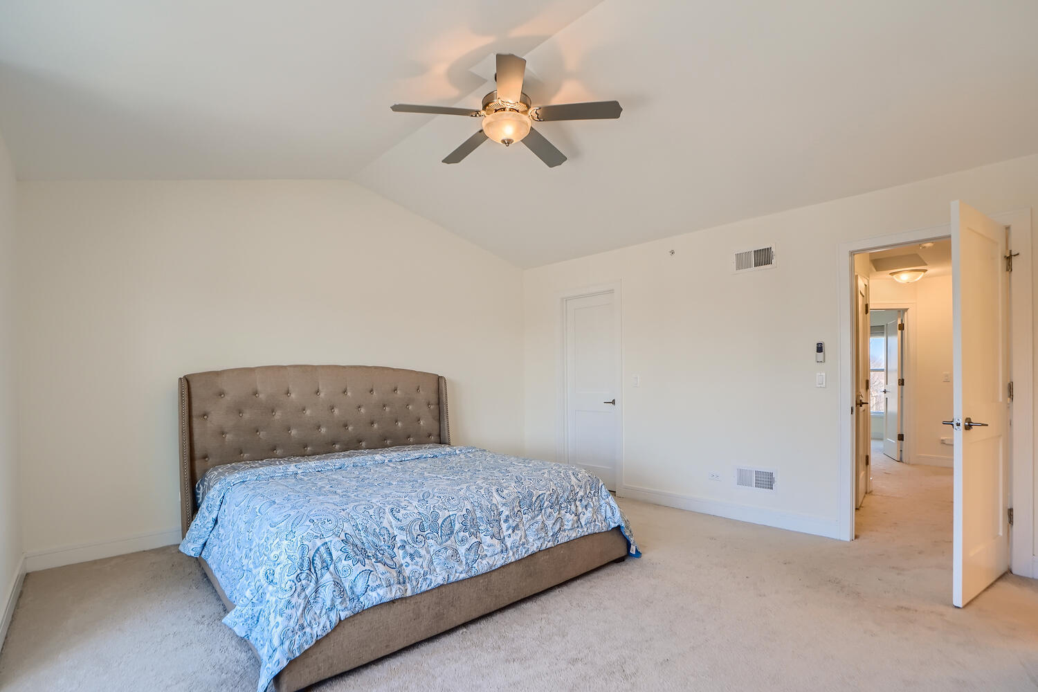 2603 Chelsey Street Buffalo Grove, IL 60089 - Photo 13 of 28 a bedroom with a bed and ceiling fan