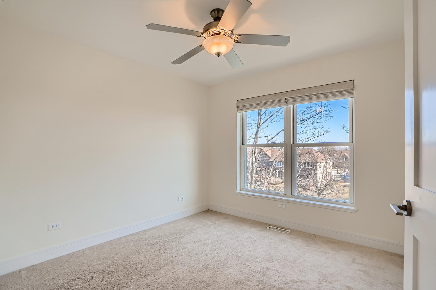 2603 Chelsey Street Buffalo Grove, IL 60089 - Photo 18 of 28 a view of an empty room with a window
