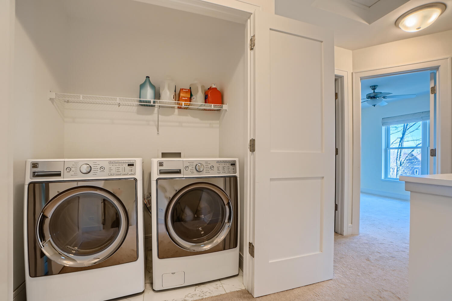 2603 Chelsey Street Buffalo Grove, IL 60089 - Photo 23 of 28 a view of washer and dryer in a kitchen
