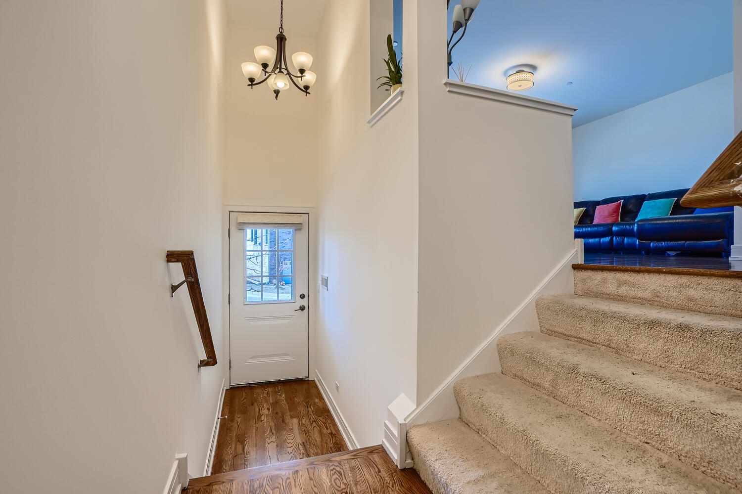 2603 Chelsey Street Buffalo Grove, IL 60089 - Photo 4 of 28 a view of a livingroom with wooden floor and stairs