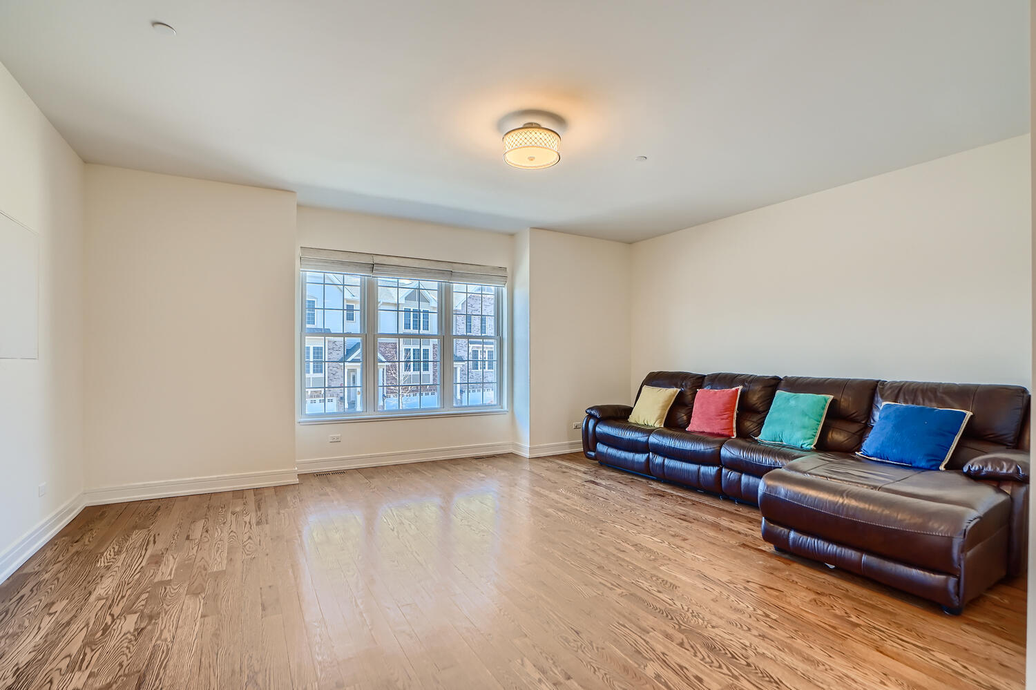 2603 Chelsey Street Buffalo Grove, IL 60089 - Photo 5 of 28 a living room with furniture and a wooden floor