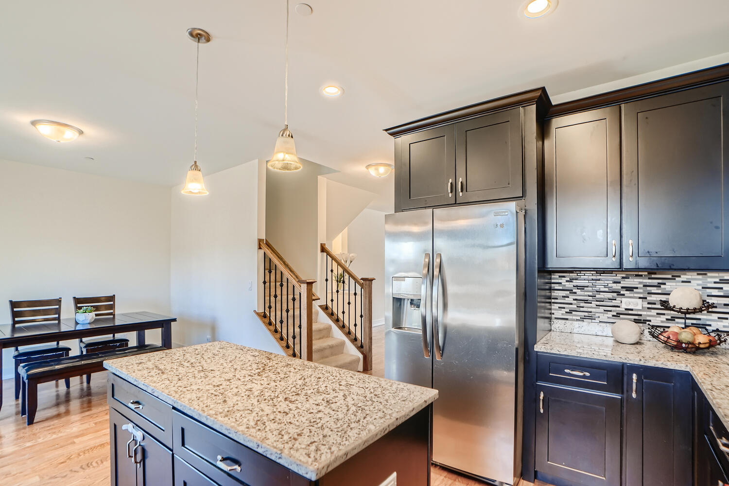 2603 Chelsey Street Buffalo Grove, IL 60089 - Photo 9 of 28 a kitchen with kitchen island a counter top space cabinets and stainless steel appliances