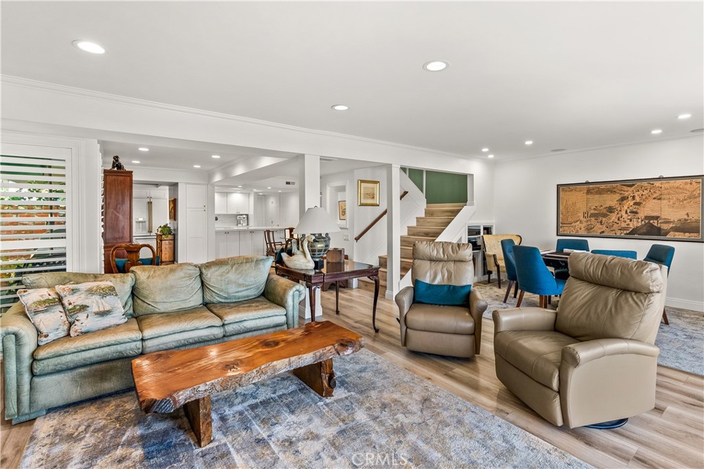 5 Canal Circle Newport Beach, CA 92663 - Photo 12 of 30 a living room with furniture and a large window