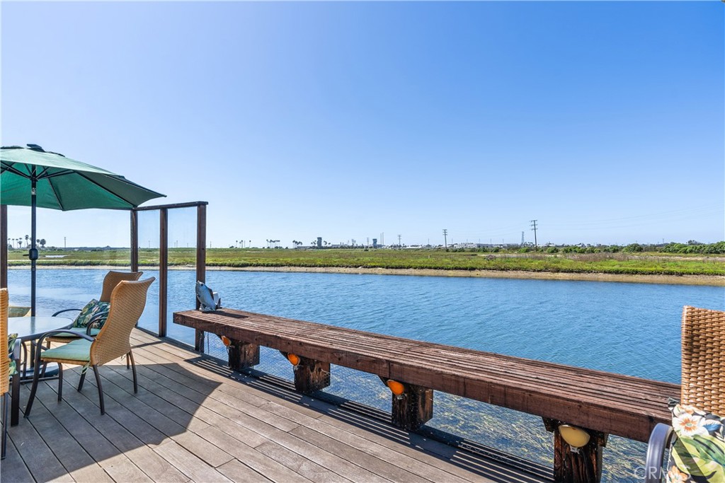 5 Canal Circle Newport Beach, CA 92663 - Photo 2 of 30 a view of a terrace with sitting area