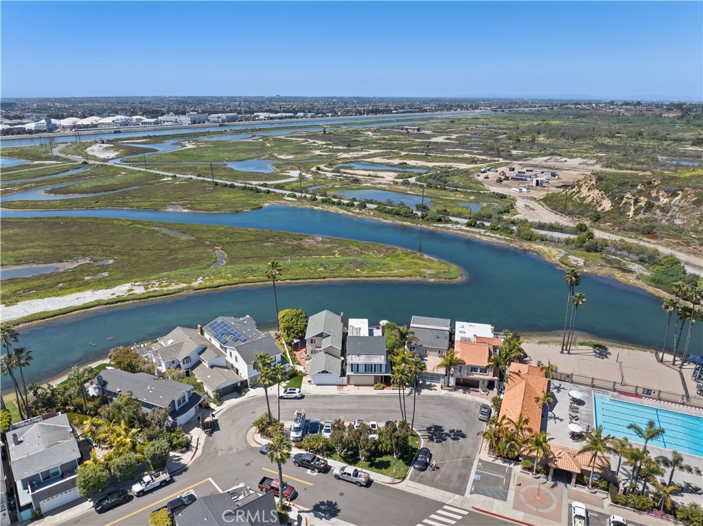 5 Canal Circle Newport Beach, CA 92663 - Photo 26 of 30 a view of an ocean and a building