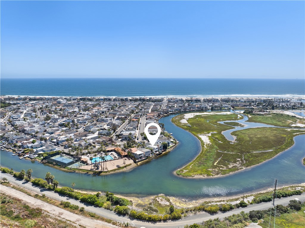 5 Canal Circle Newport Beach, CA 92663 - Photo 30 of 30 an aerial view of a house with a swimming pool outdoor seating and yard