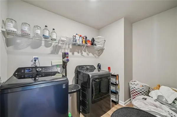 a bedroom with a bed and cabinets